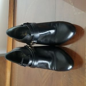 Cole Haan black booties. Side zip 2 and 3/4 " heel